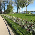 Marie's Tranquil Terrace Apartments: Lakeside Retreat With Parking Apartment *